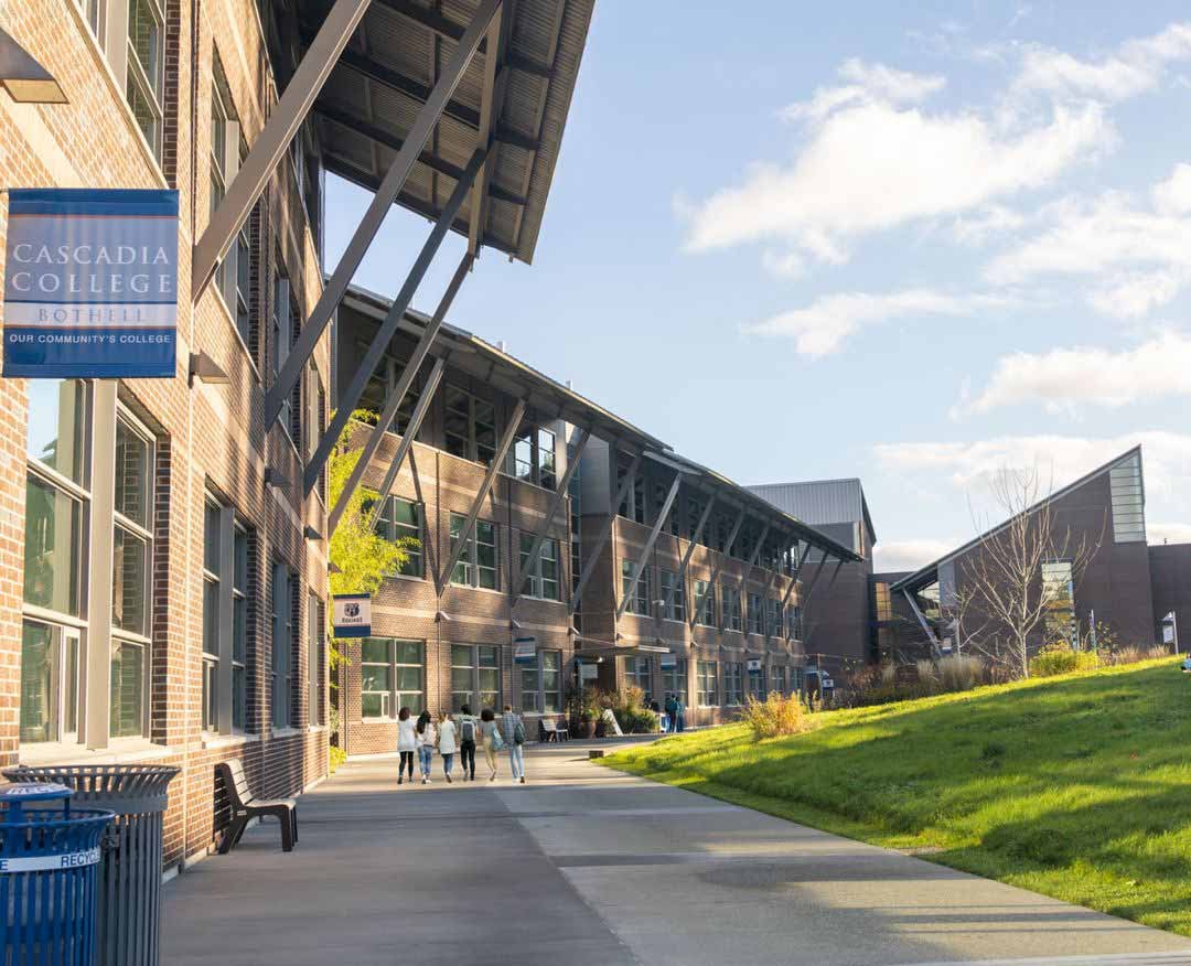 Students walk on campus sidewalks